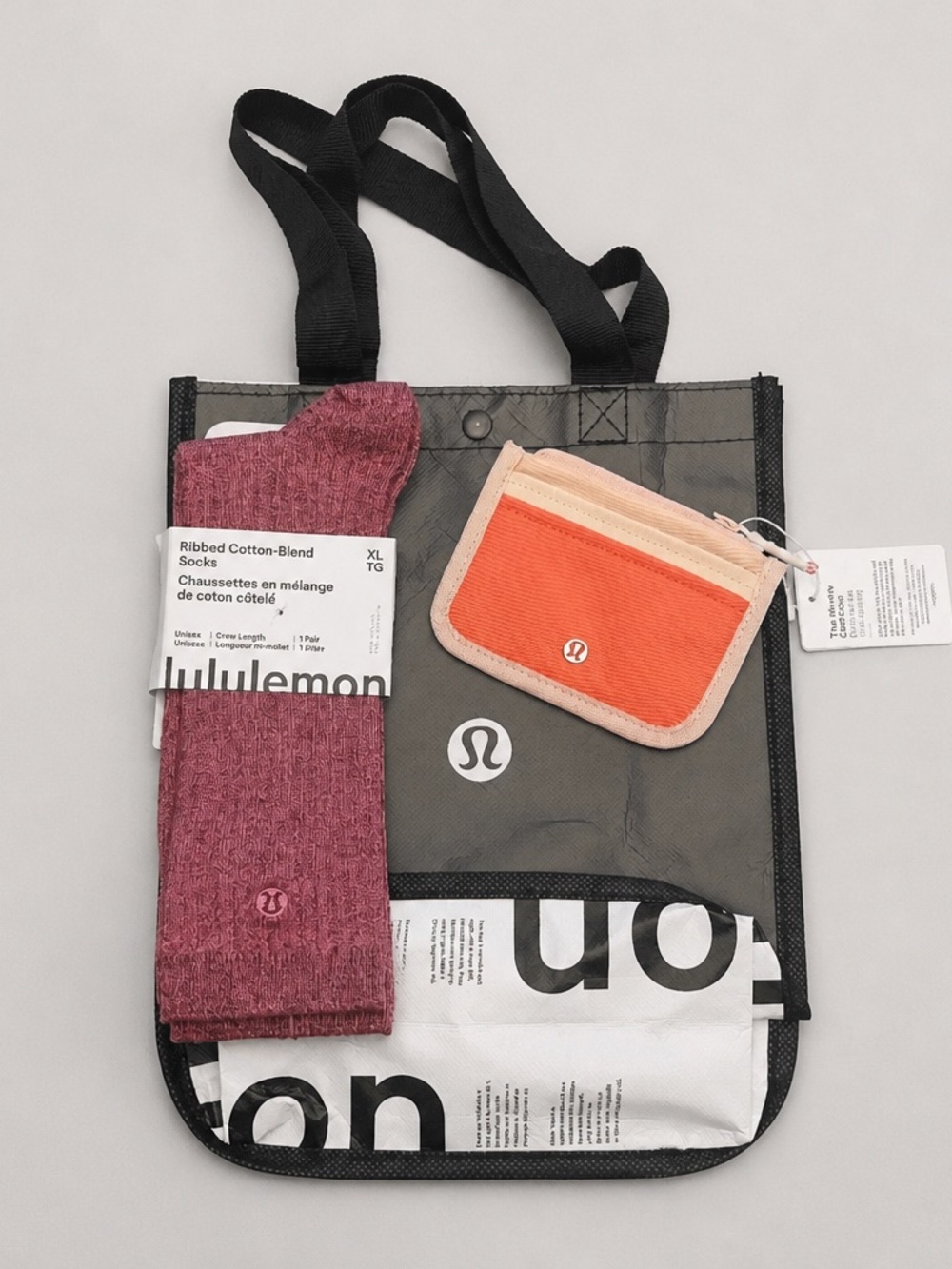 lululemon athletica Black Tote with Pink Socks and True Identity Card Case